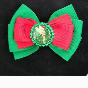 Green and Red Bow with Bottle Cap Center